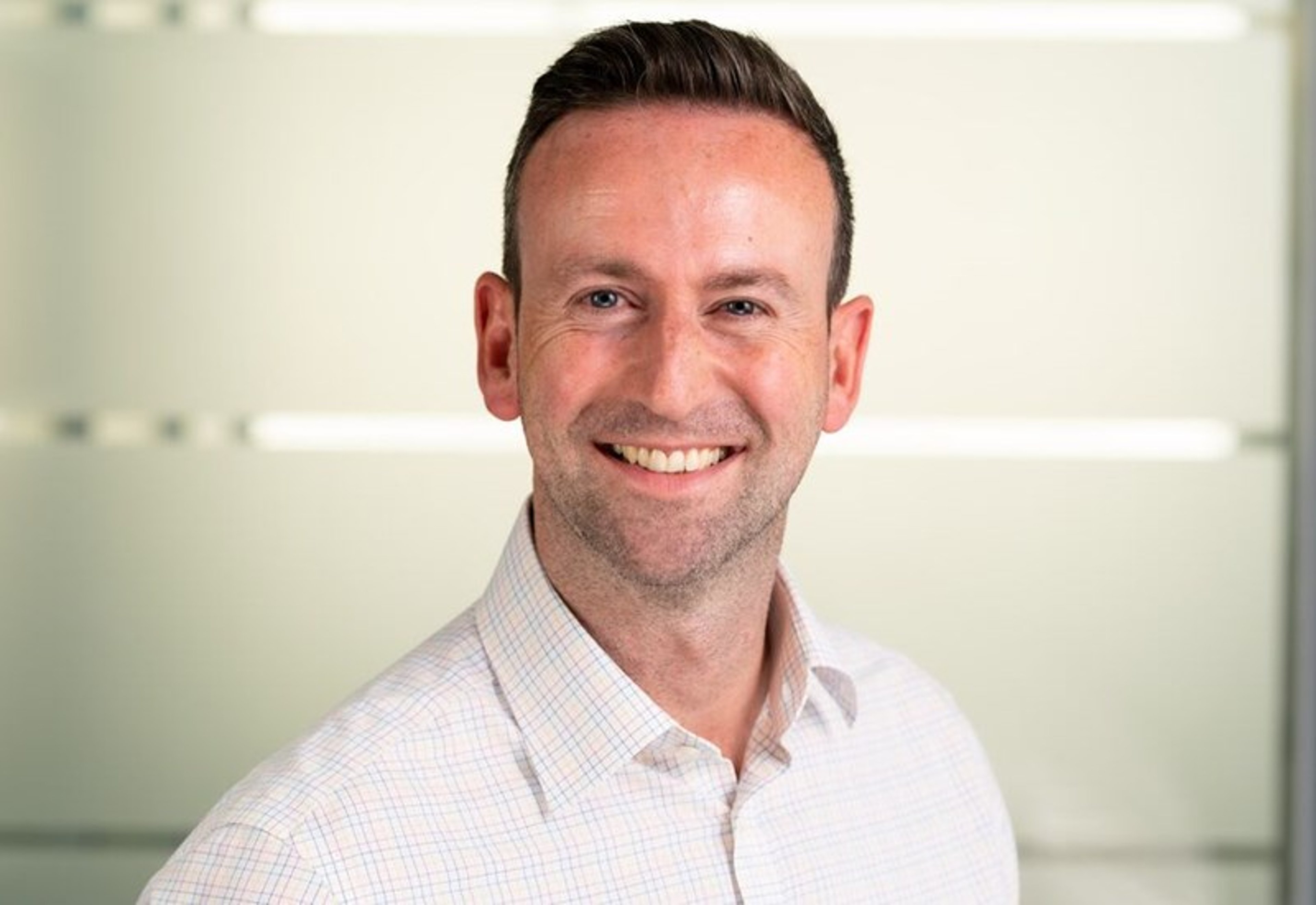 A headshot of James Fennessey